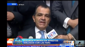 El candidato presidencial, Óscar Ivan Zuluaga, atiende a los medios de comunicación tras conocer los resultados electorales